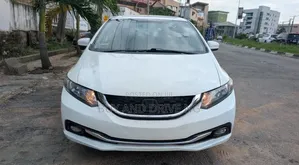 Honda Civic EX-L w/Navigation 2dr Coupe (1.8L 4cyl CVT) 2015 White
