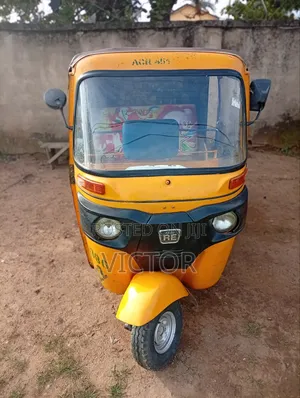 Bajaj RE 2023 Yellow