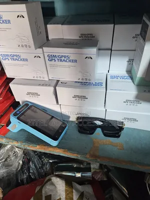 A White GPS Tracker Is Used to Monitor and Locate Vehicles, Assets,