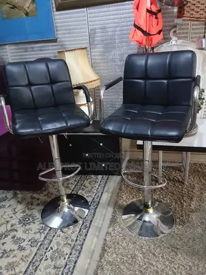 Foreign Used Pair of Ikea Leather Chrome Swivel Chair