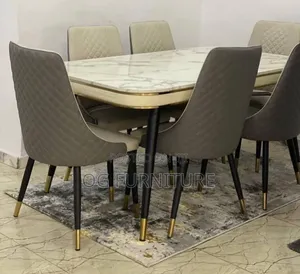 A Standard Luxury Marble Dinning Table With Six Chairs You Can Afford