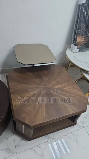 A Unique Brown Wooden Center Table Available as Seen