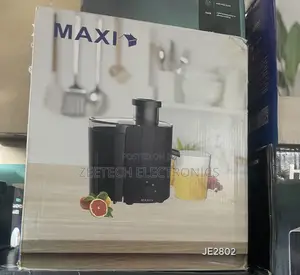 Maxi Je2802 Juice Extractor With a 0.5-Liter Capacity.