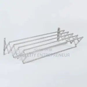 Wall-Mounted, Collapsible Clothes Drying Rack.
