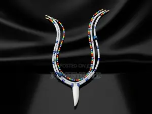 Handmade Multi-Strand Beaded Necklace With Fang Pendant.