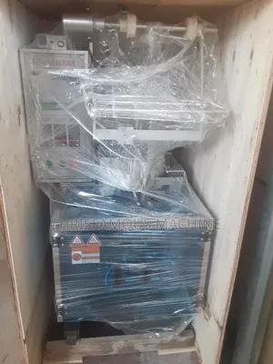 Liquid Filling and Packaging Machine