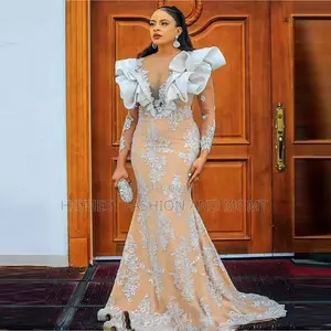Sheer Neck Long Sleeves Mermaid Dress