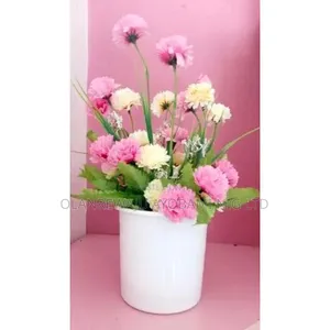 Artificial Flower in a Mini White Pot