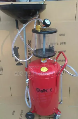 Red Pneumatic Oil Extractor Is a Commercial Automotive Garage Tool