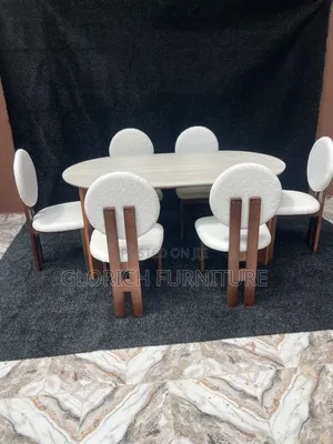 Oval Dining Set–6-Seater With Stone-Finish Top Round Boucle Backrest