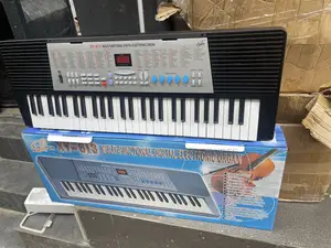 Children Learning Keyboard
