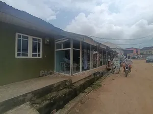 Half Plot of Land Corner Pieces on a Tarred Road