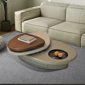 Oval Rotating Coffee Table – Cream Body With Walnut Top