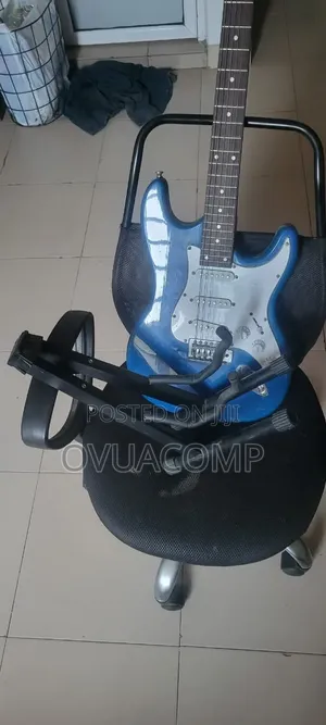 Electric Guitar With Guitar Stand (Optional)