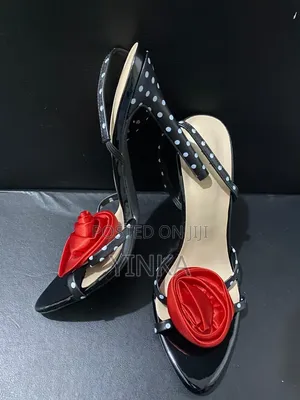 Sandal Heel With a Red Rose