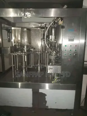 Model XGF 883, Automatic Washing, Filling,Capping Mono Block