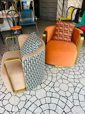 Luxury Burnt Orange Velvet Swivel Chairs