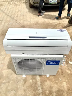 Very Clean 1.5hp Midea Air Conditioner With Indoor Hanger and Remote