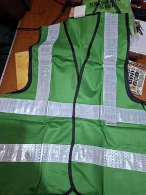 Green Reflective Jacket With Plastic Reflective Stripes