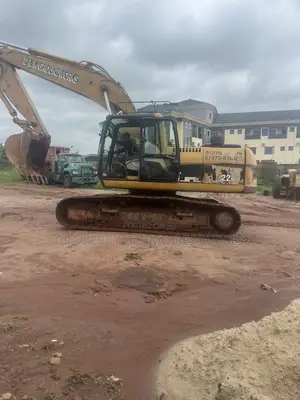 320 Bl Excavator for Rent in Lagos and Ogun State
