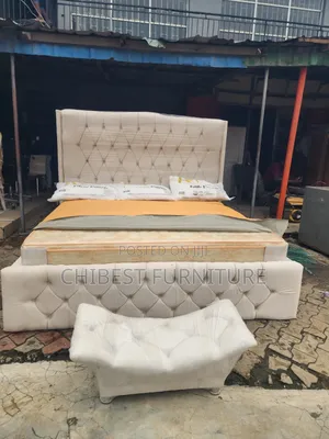 Family King Size Bed Frame With Its Footrest.