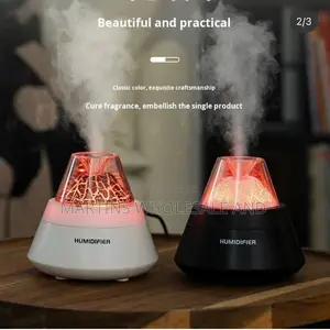 Volcano Design Tabletop Humidifier Features a White Base and a Transpa