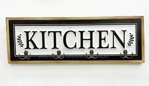 Wall-Mounted Kitchen Hook Rack With the Word "Kitchen"