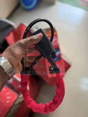 Steering Wheel to Seat Belt Lock