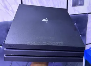 Pure Uk Used Ps 4 Pro With 2 Controllers and Games