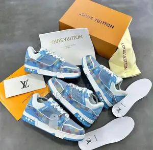 Louis Vuitton Trainer Sneakers Featuring a Distinct Light Blue Denim