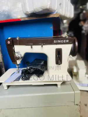 Electric And Manual Sewing Machine