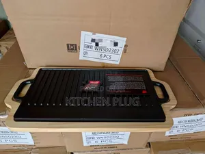 Cast Iron Grill Pan Packaged With a Wooden Serving Platter.