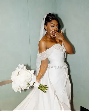 Elegant Pearl-Encrusted Satin Mermaid Wedding Gown
