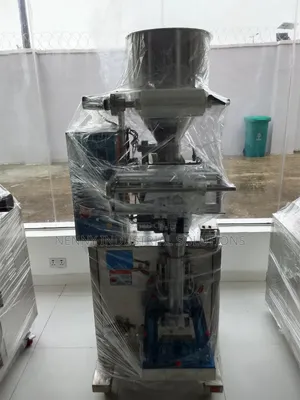1kg Granule Packaging Machine With Auto Loader and Conveyor