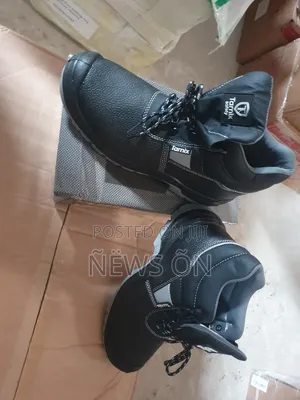 Tarnix Safety Boots Feature A Black Leather Upper And A High-top