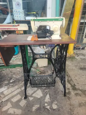 Complete Singer Electric and Manual Machine