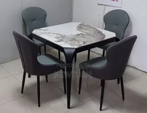 Four Seaters Marble Dining Set.