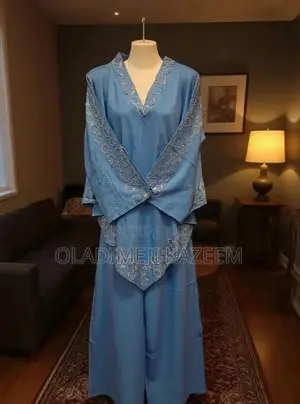 One Set of 2 Pieces With Scarf of a Quality Material Blouse Trouser