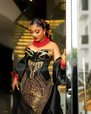 Gold Sequin Butterfly Motif Traditional Dress and Coral Accent Styling