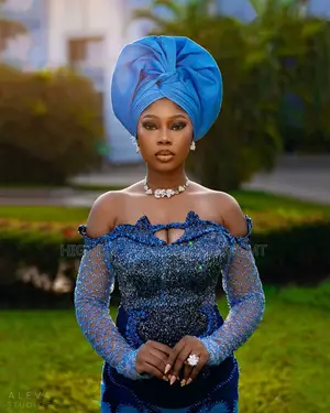 Premium Multi-Toned Blue Encrusted Bridal Gown With Trumpet Flounce