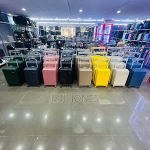 High Quality Wide Handle 4-Wheel Plastic Luggage - New*