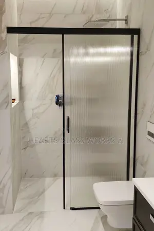 Enjoy Frameless Shower Cubicle Installed With Flutted Glass