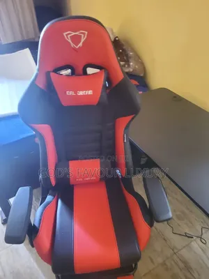 Electric Adjustable Desk and Gaming Chair.