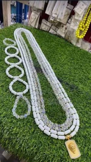 4 Strands Of White Quality Bead