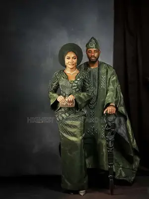 Luxury Forest Green Textured Bridal Gown With Sheer Veil Gele