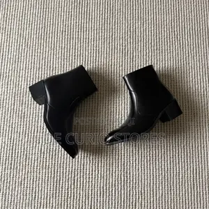 The Heeled Leather Ankle Boot in Black