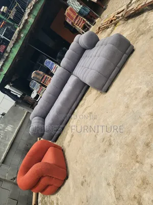 Luxury L-Shaped Sofa Fabric Chair With Its Single Chair.