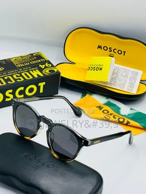 Luxury Moscot Branded Sunglasses Black Frame and Light Tinted Lenses.