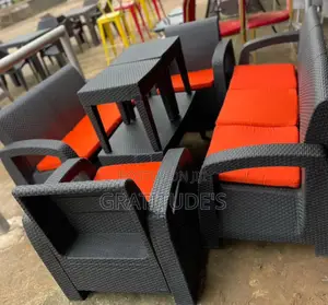 Quality Rattan Chairs With Center Table and Side Stools