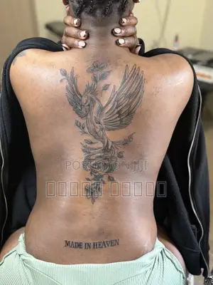 J J Premium Tattoo Shop and Hair Groom.